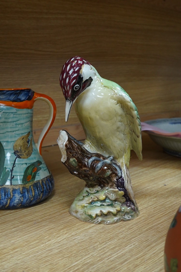 A Beswick woodpecker, two Myott jugs and two Wedgwood teapots and covers, largest 22cm